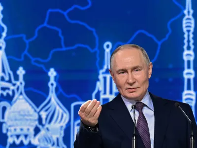 Russian President Vladimir Putin gestures during the annual congress of the Russian Union of Industrialists and Entrepreneurs in Moscow, Russia, Thursday, March 26, 2026. (Yury Kochetkov, Sputnik, Kremlin Pool Photo via AP)