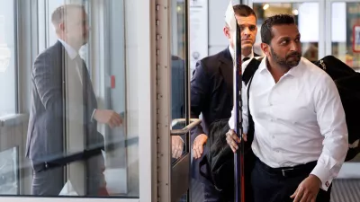 FBI Director Kash Patel walks to the locker room ahead of the annual lawmakers vs. lobbyist Congressional Hockey Challenge charity hockey game at MedStar Capitals Iceplex on Thursday, March 26, 2026, in Arlington, Va. (AP Photo/Tom Brenner)
