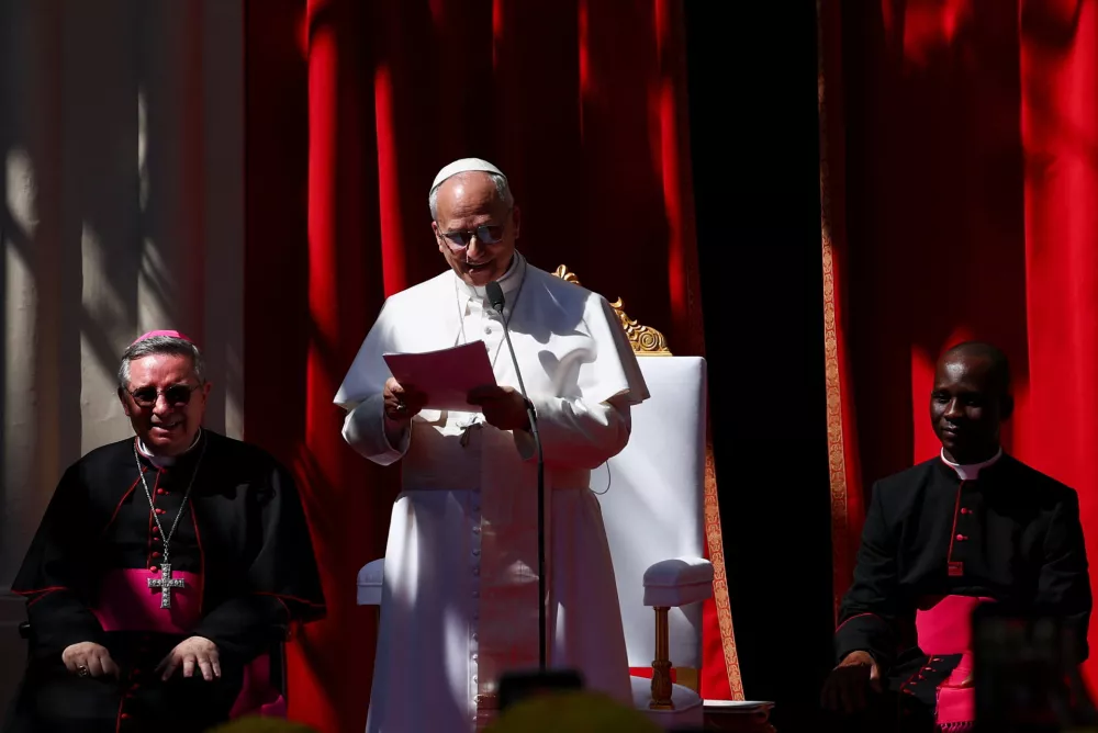 Pope Leo XIV attends a meeting with young people and catechumens outside the Church of Saint Devota, as part of a one-day trip in Monaco, March 28, 2026. REUTERS/Guglielmo Mangiapane