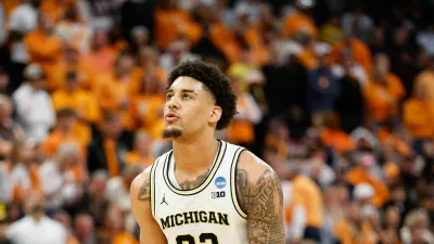 Mar 29, 2026; Chicago, IL, USA; Michigan Wolverines forward Yaxel Lendeborg (23) shoots a free throw in the second half against the Tennessee Volunteers during an Elite Eight game of the Midwest Regional of the men's 2026 NCAA Tournament at United Center. Mandatory Credit: Kamil Krzaczynski-Imagn Images