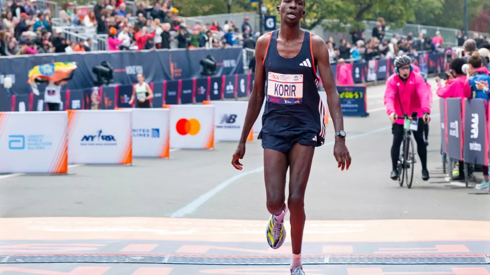 FILE - Albert Korir of Kenya crosses the finish line in second place at the New York City Marathon, Sunday, Nov. 5, 2023, in New York. (AP Photo/Craig Ruttle, File)