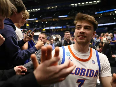Florida guard Urban Klavzar (7) greets fans after Florida?s 114-55 win over Prairie View A&M of the NCAA March Madness opening round at Benchmark international Arena in Tampa, FL on Friday, March 20, 2026. [Alan Youngblood/Gainesville Sun]