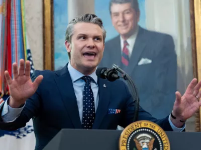 Defense Secretary Pete Hegseth speaks during the swearing-in for Homeland Security Secretary Markwayne Mullin in the Oval Office of the White House, Tuesday, March 24, 2026, in Washington. (AP Photo/Alex Brandon)