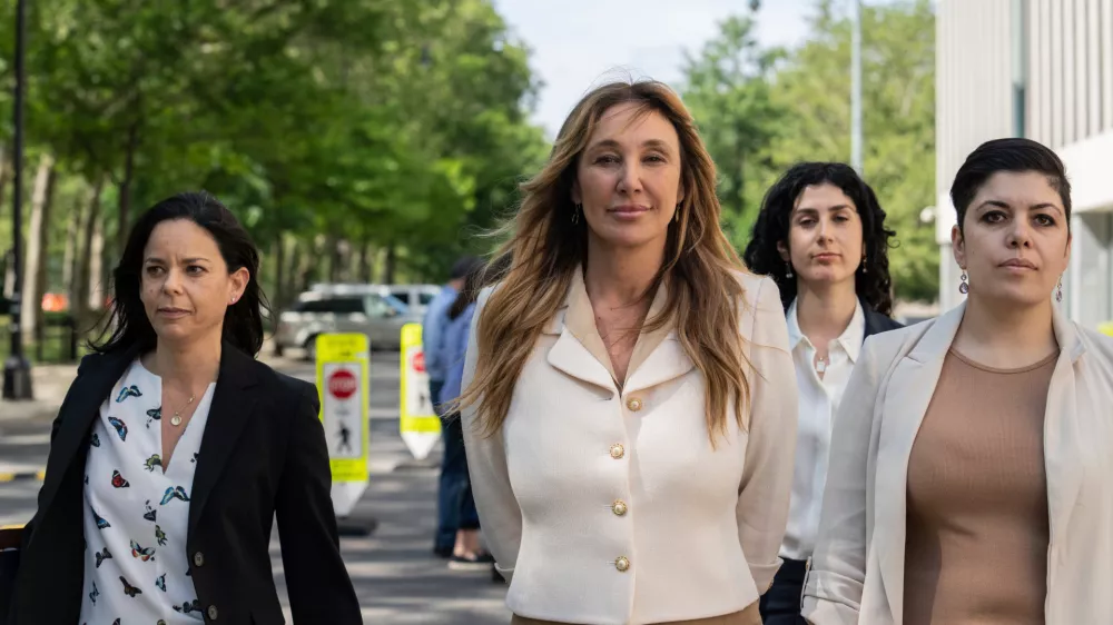 FILE - Nicole Daedone, center, founder and former CEO of OneTaste, departs Brooklyn federal court on Tuesday, June 13, 2023 in New York. (AP Photo/Jeenah Moon, File)