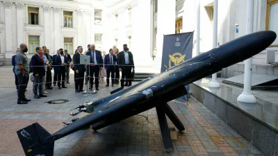 FILE PHOTO: Ukrainian Foreign Minister Andrii Sybiha shows Israeli Foreign Minister Gideon Saar a Russian kamikaze drone Geran, a copy of an Iranian-made Shahed-136 unmanned aerial vehicle, amid Russia's attack on Ukraine, in Kyiv, Ukraine, July 23, 2025. REUTERS/Valentyn Ogirenko/File Photo/File Photo