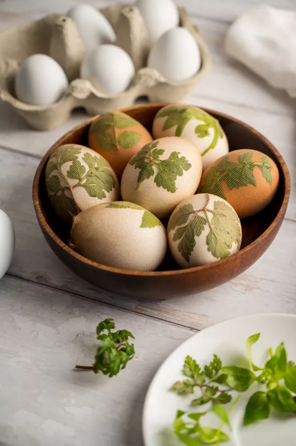 DIY Easter eggs with natural leaves, creating patterns on eggs using plants. Eco friendly colouring easter eggs