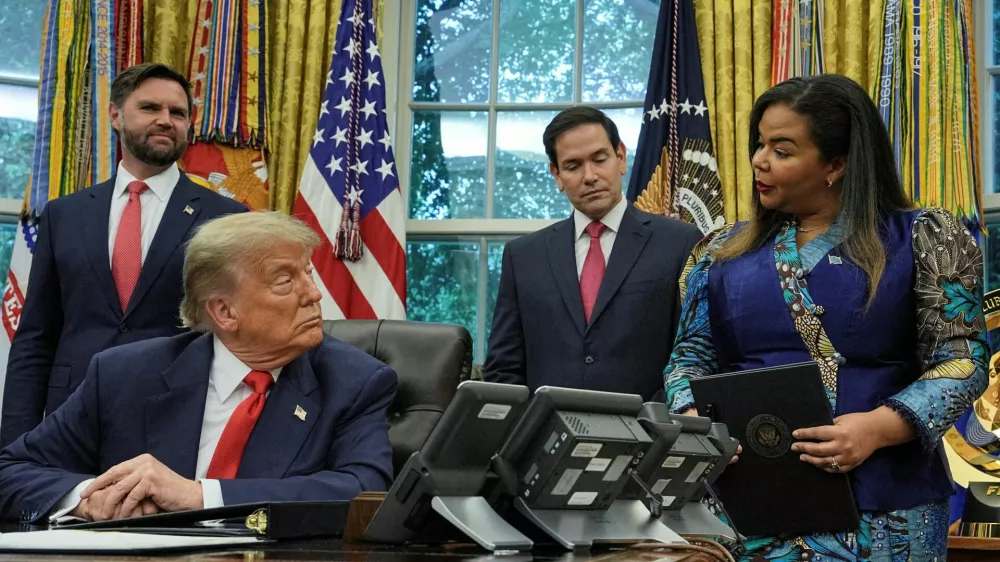 FILE PHOTO: U.S. President Donald Trump, Secretary of State Marco Rubio and Vice President JD Vance meet Democratic Republic of the Congo's Foreign Minister Therese Kayikwamba Wagner and Rwanda's Foreign Minister Olivier Nduhungirehe (not pictured) in the Oval Office at the White House in Washington D.C., June 27, 2025. REUTERS/Ken Cedeno/File Photo