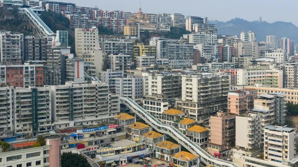 Wushan,China.14th January 2026. The aerial photos captured the soon-to-be-operational Goddess Escalator (Shenn&uuml; Da Futi) located in Wushan County, southwest China's Chongqing Municipality, January 14, 2026. The Goddess Escalator project is built along the existing north-south urban central axis of Shenn&uuml; Avenue. It is a multi-level electric escalator system designed as a key vertical transit corridor for the city, with a total longitudinal length of approximately 905 meters, surpassing the Chongqing Crown Escalator. The total vertical lift height is over 240 meters, equivalent to the height of an 80-story building. The project includes 21 escalators, 8 elevators (including barrier-free bridge elevators), 4 moving walkways, 2 pedestrian footbridges, and 2 crossover passages. Once operational, travel time along the upper and lower sections of Shenn&uuml; Avenue will be reduced from nearly one hour to about 20 minutes, significantly facilitating daily commuting for residents and sightseeing for tourists. Credit: He Penglei/China News Service/Alamy Live News,Image: 1066197235, License: Rights-managed, Restrictions: Usage restrictions: Advertising and promotion,Commercial electronic,Consumer goods,Direct mail and brochures,Indoor display,Internal business usage,Personal use, Model Release: no
