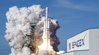 FILE - A Falcon 9 SpaceX heavy rocket lifts off from pad 39A at the Kennedy Space Center in Cape Canaveral, Fla., Tuesday, Feb. 6, 2018. (AP Photo/John Raoux, File)