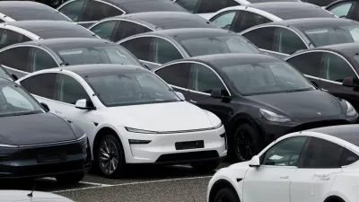 FILE PHOTO: Tesla electric vehicles are pictured at one of the company's delivery centers in Valenton, near Paris, France, April 24, 2025. REUTERS/Benoit Tessier/File Photo