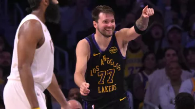Mar 31, 2026; Los Angeles, California, USA; Los Angeles Lakers guard Luka Doncic (77) reacts after a basket in the second half against the Cleveland Cavaliers at Crypto.com Arena. Mandatory Credit: Jayne Kamin-Oncea-Imagn Images