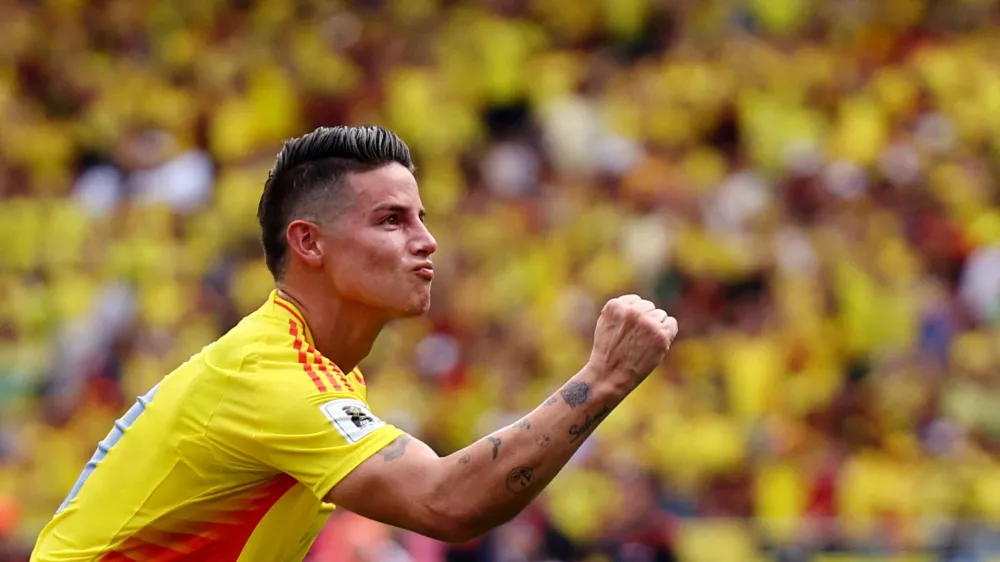 Soccer Football - World Cup - South American Qualifiers - Colombia v Argentina - Estadio Metropolitano, Barranquilla, Colombia - September 10, 2024 Colombia's James Rodriguez celebrates after Yerson Mosquera scores their first goal REUTERS/Luisa Gonzalez   TPX IMAGES OF THE DAY