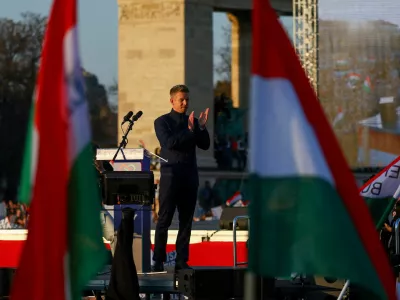 FILE PHOTO: Peter Magyar, leader of the opposition Tisza party, claps on stage during Hungary's National Day celebrations, which also commemorates the 1848 Hungarian Revolution against Habsburg rule, in Budapest, Hungary, March 15, 2026. REUTERS/Bernadett Szabo/File Photo