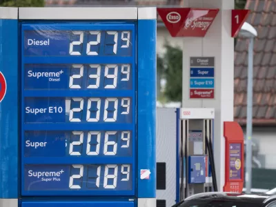 Gas prices are displayed before they were raised at noon at a gas station in Stuttgart, Germany, Wednesday, April 1, 2026. (Marijan Murat/dpa via AP)