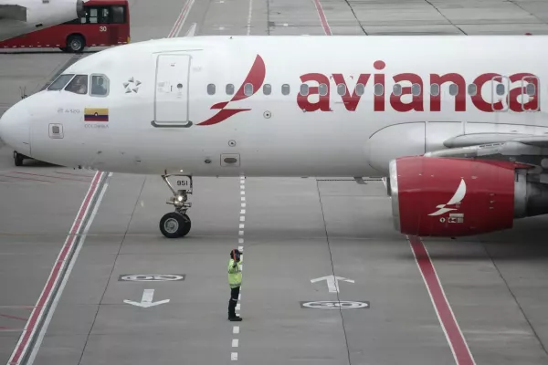 An Avianca plane sit on the tarmac at El Dorado airport in Bogota on November 28, 2025. Colombian airline Avianca reported on Friday "significant" disruptions to its flights due to a required Airbus software update affecting 70 percent of the company's fleet.,Image: 1055260627, License: Rights-managed, Restrictions:, Model Release: no