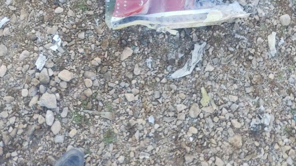 The Iranian state media said to show fragments of a downed U.S. jet in this picture said to be taken in central Iran and released on April 3, 2026. IRIB/Handout via REUTERS  THIS IMAGE HAS BEEN SUPPLIED BY A THIRD PARTY. IRAN OUT. NO COMMERCIAL OR EDITORIAL SALES IN IRAN. NO USE BBC PERSIAN. NO USE VOA PERSIAN. NO USE MANOTO. NO USE IRAN INTERNATIONAL. NO USE RADIO FARDA. REFILE - CORRECTING FROM "JETS" TO "JET" VERIFICATION: -Reuters was not able to confirm the location or date when the photos were taken. -The red stripe seen on the tail fin of the plane in the photos is consistent with the tail section of a F-15E Strike Eagle seen in file photos.