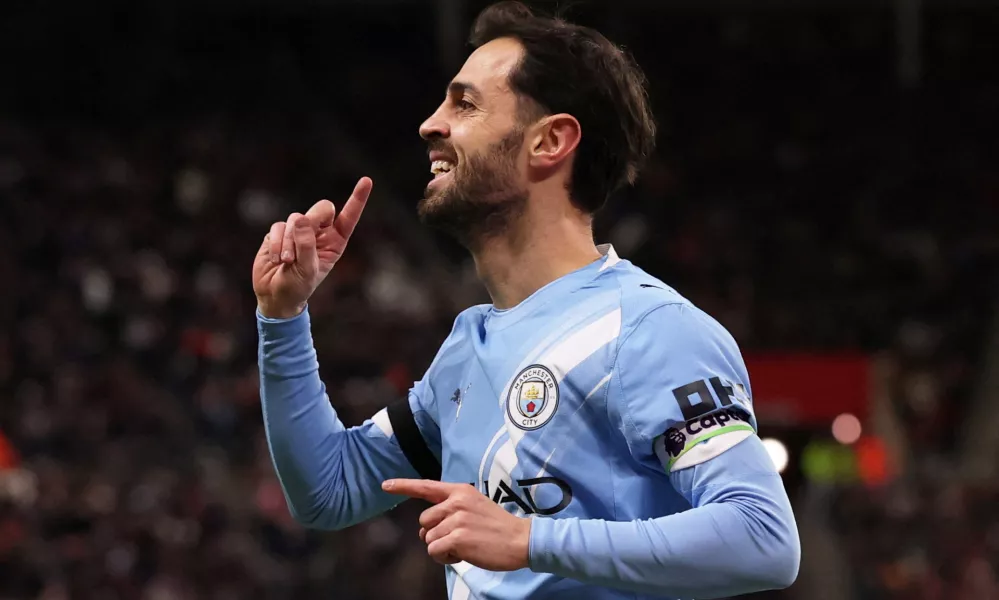 FILE PHOTO: Soccer Football - Premier League - Sunderland v Manchester City - Stadium of Light, Sunderland, Britain - January 1, 2026 Manchester City's Bernardo Silva celebrates scoring a goal that was later disallowed Action Images via Reuters/Lee Smith EDITORIAL USE ONLY. NO USE WITH UNAUTHORIZED AUDIO, VIDEO, DATA, FIXTURE LISTS, CLUB/LEAGUE LOGOS OR 'LIVE' SERVICES. ONLINE IN-MATCH USE LIMITED TO 120 IMAGES, NO VIDEO EMULATION. NO USE IN BETTING, GAMES OR SINGLE CLUB/LEAGUE/PLAYER PUBLICATIONS. PLEASE CONTACT YOUR ACCOUNT REPRESENTATIVE FOR FURTHER DETAILS../File Photo