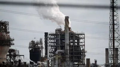 The Shell Norco petroleum refinery and the Valero St. Charles oil refinery are seen in Norco, La., Thursday, April 2, 2026. (AP Photo/Gerald Herbert)