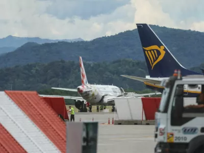 Aircrafts are seen at Milan Bergamo Airport, after flight operations were temporarily suspended when a person died on a runway during take-off preparations, in Orio al Serio, near Bergamo, Italy, July 8, 2025. REUTERS/Claudia Greco