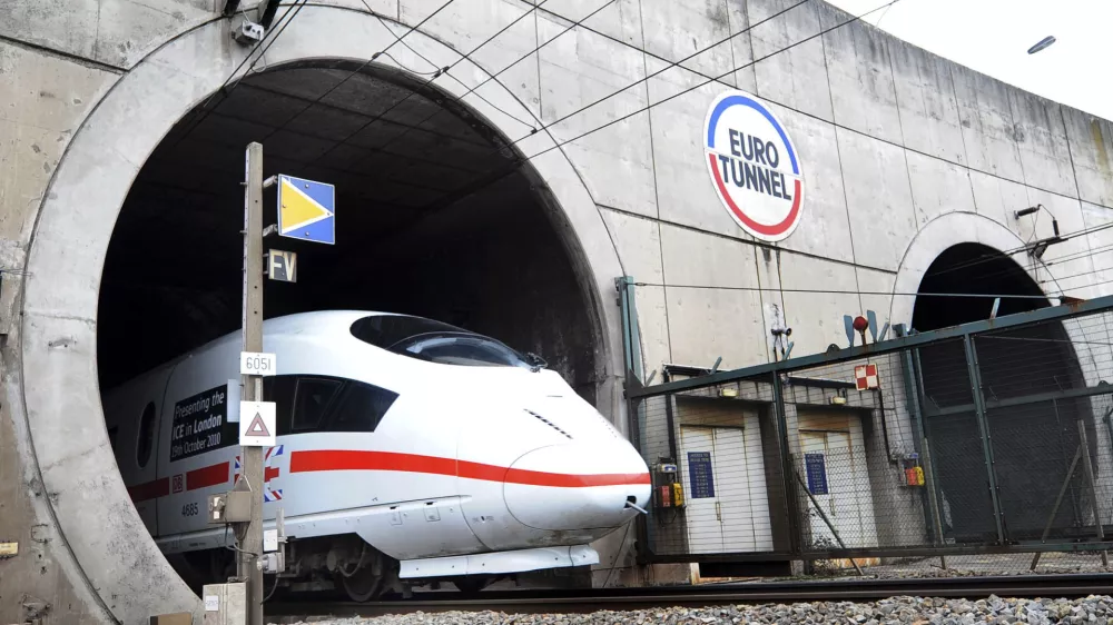 A German ICE high speed train exits the Channel Tunnel that links France to Britain as part of a test, Wednesday Oct. 13, 2010 in Coquelles, northern France. Eurotunnel Chairman will later hold a news conference to discuss planned tests of Siemens-built train that Deutsche Bahn wants to put into service through the under-sea link between Britain and the continent, amid controversy over competitor Eurostar's plans for a $1.1 billion order for similar trains. (AP Photo)