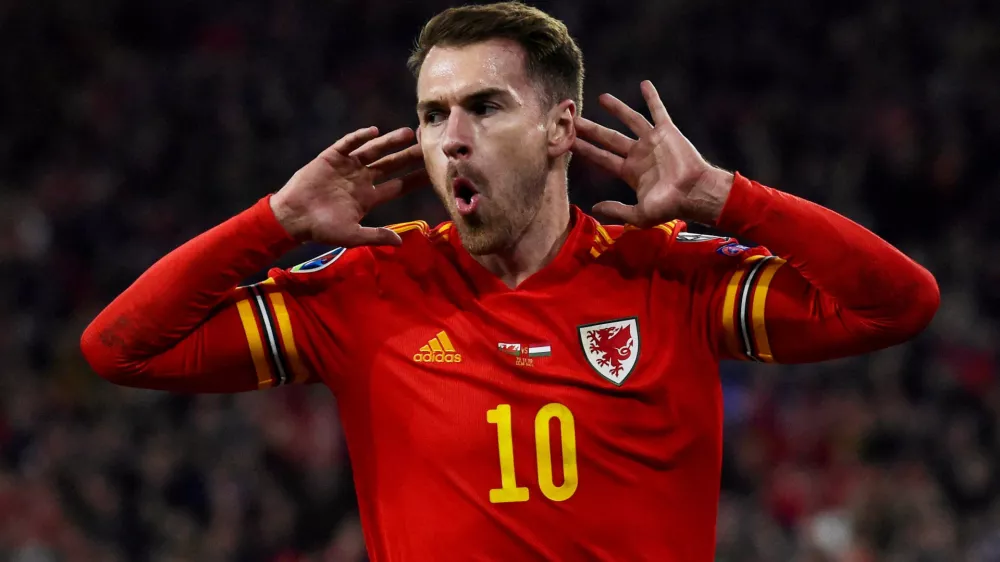 FILE PHOTO: Soccer Football - Euro 2020 Qualifier - Group E - Wales v Hungary - Cardiff City Stadium, Cardiff, Wales, Britain - November 19, 2019 Wales' Aaron Ramsey celebrates scoring their first goal REUTERS/Rebecca Naden/File Photo
