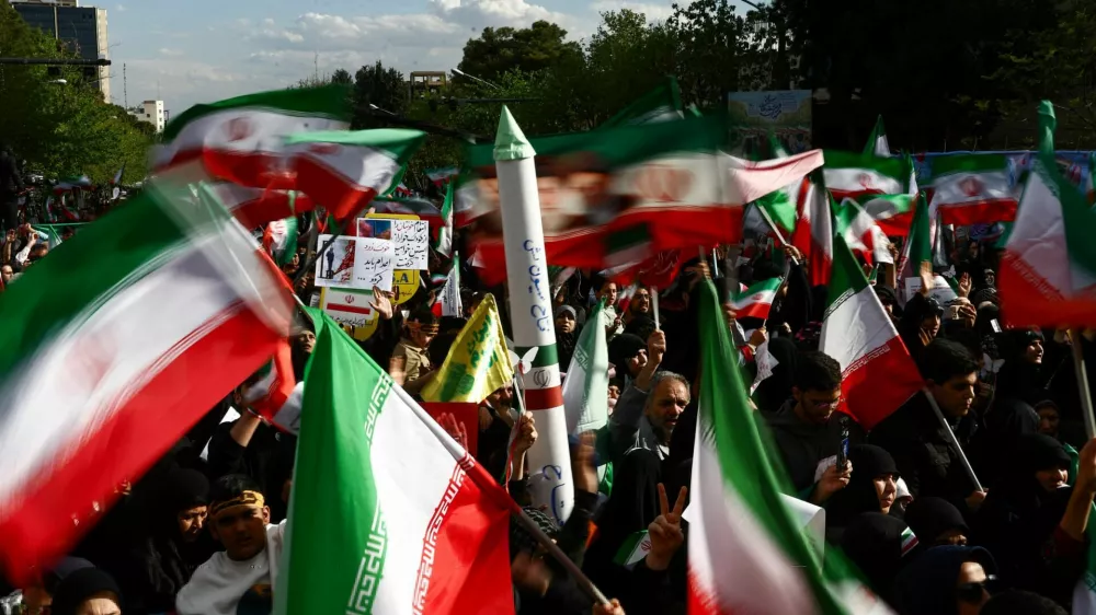 Iranian people attend a ceremony marking 40 days since schoolchildren were killed in a strike on a girls' primary school in Minab, amid the U.S.-Israeli conflict with Iran, in Tehran, Iran, April 7, 2026. Majid Asgaripour/WANA (West Asia News Agency) via REUTERS ATTENTION EDITORS - THIS PICTURE WAS PROVIDED BY A THIRD PARTY