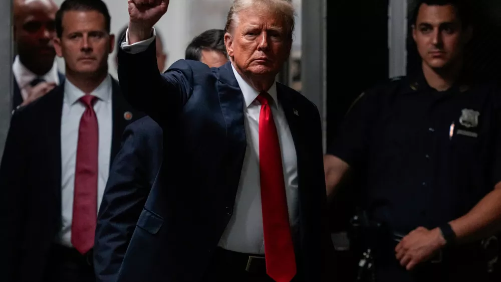 FILE - Former President Donald Trump returns from a lunch break at Manhattan Criminal Court, May 28, 2024, in New York. (AP Photo/Julia Nikhinson, Pool, File)