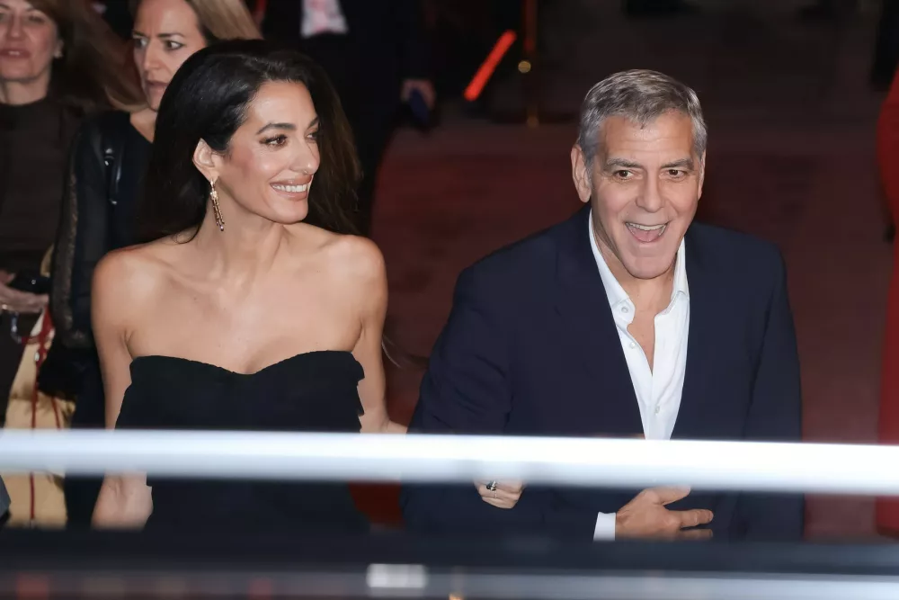 Milan, Arrivals at the Omega House Opening Night during the XXV Olympic Winter Games Milan Cortina 2026. Pictured: George Clooney (Actor), Amal Clooney (Lebanese-British lawyer)-/ ipa-agency.net - //IPAPRESSITALY_IPA_Agency_IPA71105243/Credit:/IPA/SIPA/2602081132,Image: 1073072276, License: Rights-managed, Restrictions:, Model Release: no