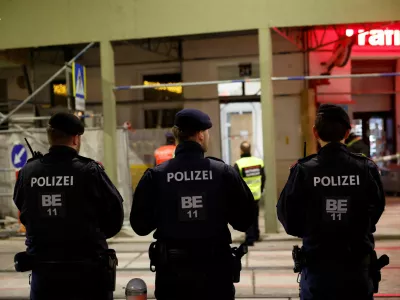 Police officers guard a construction site after scaffolding collapsed in the upmarket ninth district of Vienna, Austria, March 17, 2026. REUTERS/Lisa Leutner