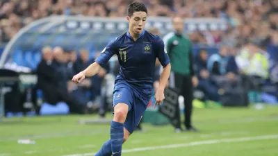 FILE - France's Samir Nasri, controls the ball during their group I World Cup qualifying soccer match between France and Finland at the Stade de France stadium in Saint Denis outside of Paris, Oct. 15, 2013. (AP Photo/Michel Euler, File)