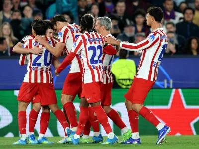 Soccer Football - UEFA Champions League - Quarter Final - First Leg - FC Barcelona v Atletico Madrid - Spotify Camp Nou, Barcelona, Spain - April 8, 2026 Atletico Madrid's Julian Alvarez celebrates scoring their first goal with teammates REUTERS/Nacho Doce