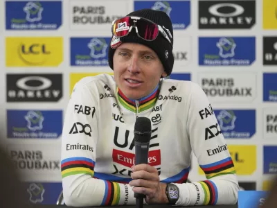 Tadej Pogacar, of Slovenia, speaks with the media after finishing second in the Paris-Roubaix cycling race in Roubaix, France, Sunday, April 13, 2025. (AP Photo/Thibault Camus)