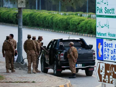Army soldier arrive at the D Chowk area, near the President's house, as Pakistan prepares to host the U.S. and Iran for peace talks, in Islamabad, Pakistan, April 9, 2026. REUTERS/Akhtar Soomro