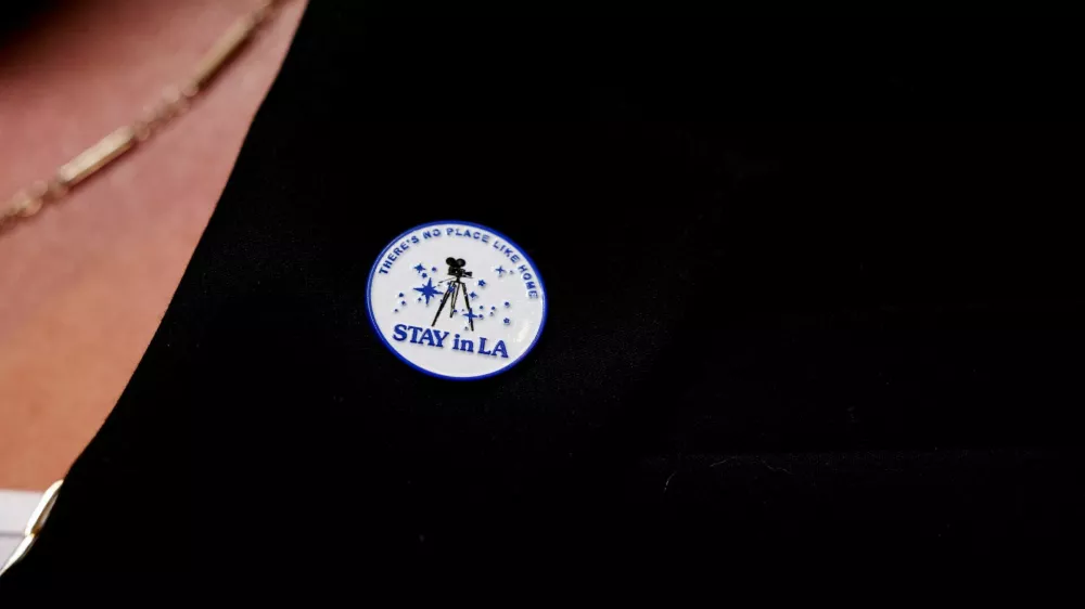 Producer and writer Simran Baidwan wears a pin about keeping filming in Los Angeles as she attends a red carpet for the television series The Pitt at PaleyFest LA 2026 in Los Angeles, California, U.S. April 12, 2026. REUTERS/Jill Connelly