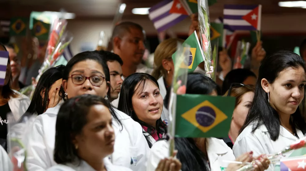Cuban doctors take part in a welcoming ceremony at the Jose Marti International Airport after arriving from Brazil, in Havana, Cuba, November 23, 2018. REUTERS/Fernando Medina