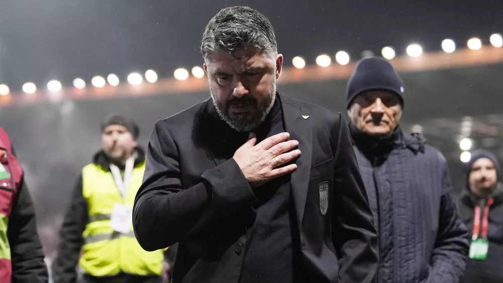 Italy's coach Gennaro Gattuso walks off the pitch after losing in a World Cup qualifying playoff final soccer match between Bosnia and Italy in Zenica, Bosnia, Tuesday, March 31, 2026. (Fabio Ferrari/LaPresse via AP)