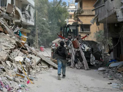 FILE PHOTO: A bulldozer works at the site of last wednesday's Israeli strike, in Tyre, Lebanon, April 10, 2026. REUTERS/Louisa Gouliamaki/File Photo