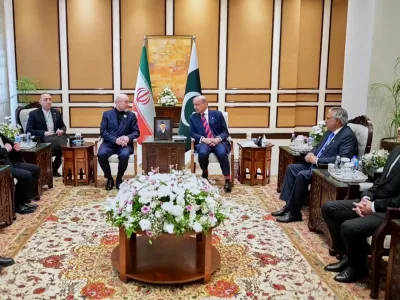 In this photo released by the Pakistan Prime Minister Office, visiting Iranian delegation headed by Iran's Parliament Speaker Mohammad Bagher Ghalibaf, third left, meet with Pakistani Prime Minister Shehbaz Sharif, in Islamabad, Pakistan, Saturday, April 11, 2026 (Pakistan Prime Minister Office via AP)