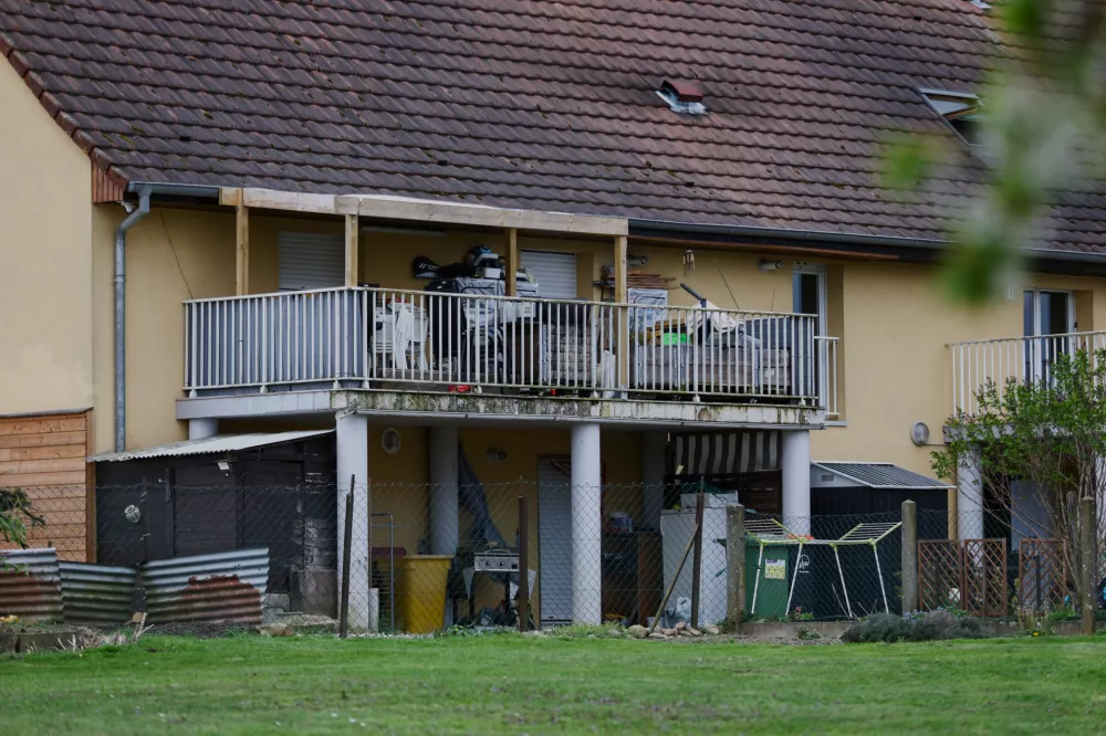 Outside view of the building where a 9-year-old boy was rescued this week after living locked in his father's utility van since 2024, in Hagenbach, Eastern France, Saturday, April 11, 2026. (AP Photo)