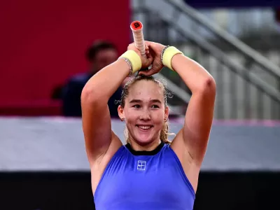 Tennis - WTA 500 - Linz Open - Design Center Linz, Linz, Austria - April 12, 2026 Russia's Mirra Andreeva celebrates after winning her final match against Austria's Anastasia Potapova REUTERS/Christian Bruna
