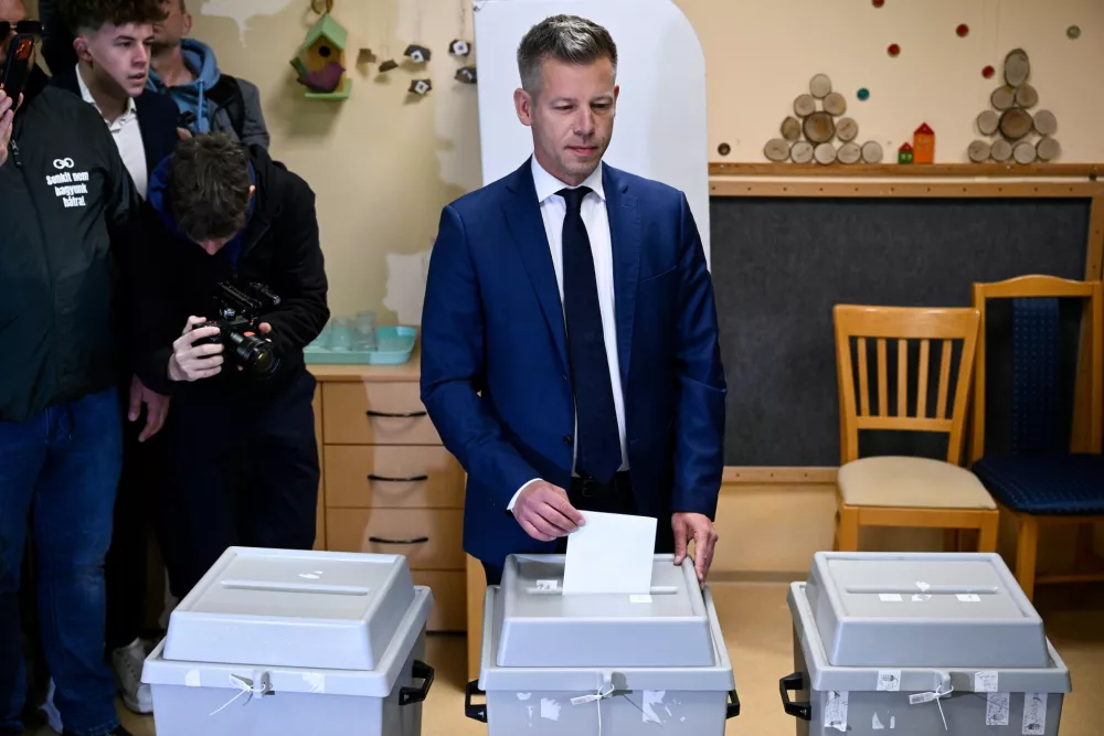President of the opposition Tisza Party Peter Magyar casts his vote at a polling station during the general election in Budapest, Hungary, Sunday, April 12, 2026. (Robert Hegedus/MTI via AP)