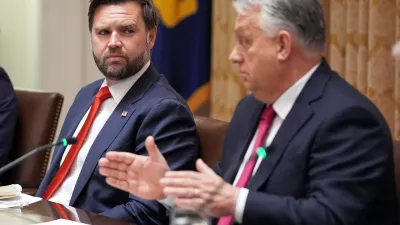 FILE - Vice President JD Vance, left, listens as Hungary's Prime Minister Viktor Orban speaks during a meeting in the Cabinet Room of the White House, Friday, Nov. 7, 2025, in Washington. (AP Photo/Evan Vucci, File)