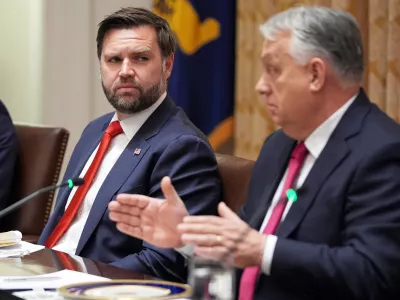 FILE - Vice President JD Vance, left, listens as Hungary's Prime Minister Viktor Orban speaks during a meeting in the Cabinet Room of the White House, Friday, Nov. 7, 2025, in Washington. (AP Photo/Evan Vucci, File)