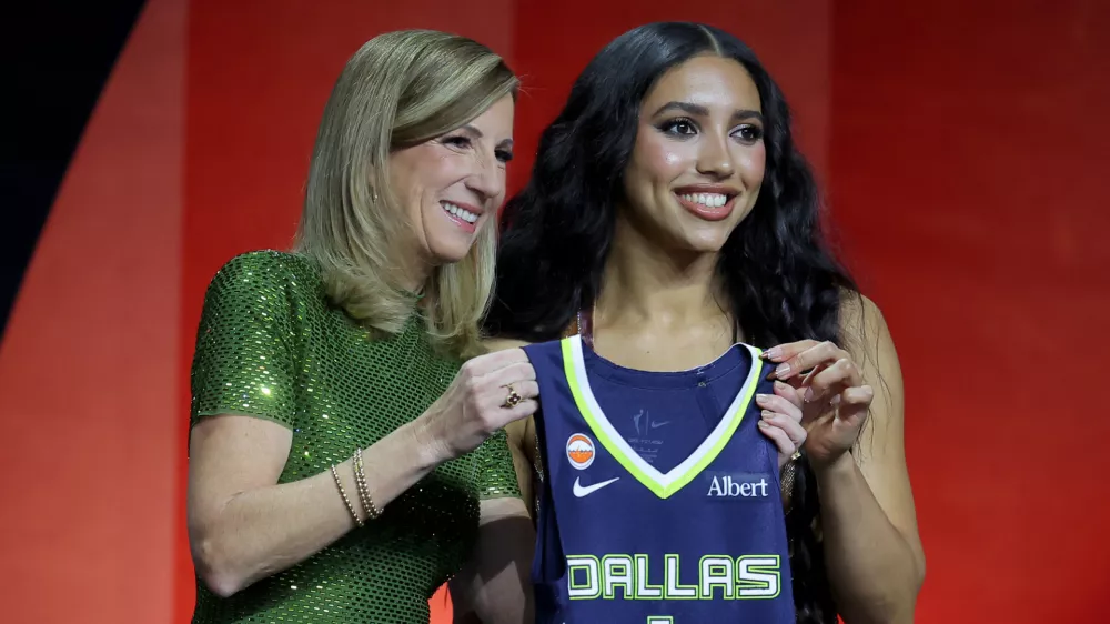 Apr 13, 2026; New York, NY, USA; WNBA Commissioner Cathy Engelbert (left) poses for photos with Azzi Fudd who was selected first overall by the Dallas Wings during the 2026 WNBA Draft at The Shed at Hudson Yards. Mandatory Credit: Brad Penner-Imagn Images