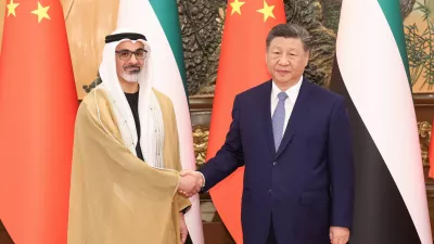 China's President Xi Jinping shakes hands with Sheikh Khaled bin Mohamed bin Zayed Al Nahyan, Crown Prince of Abu Dhabi, United Arab Emirates, in Beijing, China, April 14, 2026. cnsphoto via REUTERS ATTENTION EDITORS - THIS IMAGE WAS PROVIDED BY A THIRD PARTY. CHINA OUT. NO COMMERCIAL OR EDITORIAL SALES IN CHINA