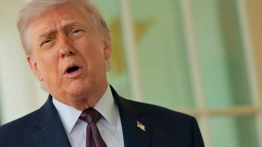U.S. President Donald Trump speaks with the media after receiving a McDonald's order via DoorDash, which was delivered to him in front of the Oval Office at the White House in Washington, D.C., U.S., April 13, 2026. REUTERS/Jonathan Ernst
