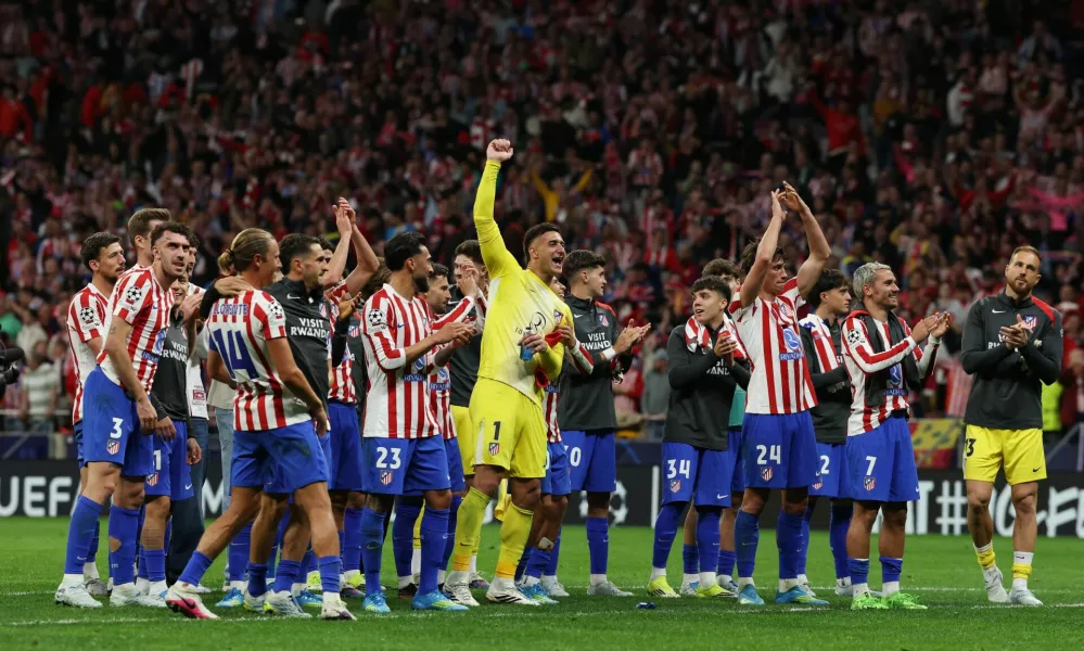 Soccer Football - UEFA Champions League - Quarter Final - Second Leg - Atletico Madrid v FC Barcelona - Riyadh Air Metropolitano, Madrid, Spain - April 14, 2026 Atletico Madrid players celebrate after the match REUTERS/Gonzalo Fuentes