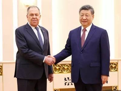 Chinese President Xi Jinping and Russia's Foreign Minister Sergei&nbsp;Lavrov&nbsp;shake hands at the Great Hall of the People in Beijing, China April 15, 2026.  China Daily via REUTERS ATTENTION EDITORS - THIS PICTURE WAS PROVIDED BY A THIRD PARTY. CHINA OUT. NO COMMERCIAL OR EDITORIAL SALES IN CHINA.   TPX IMAGES OF THE DAY