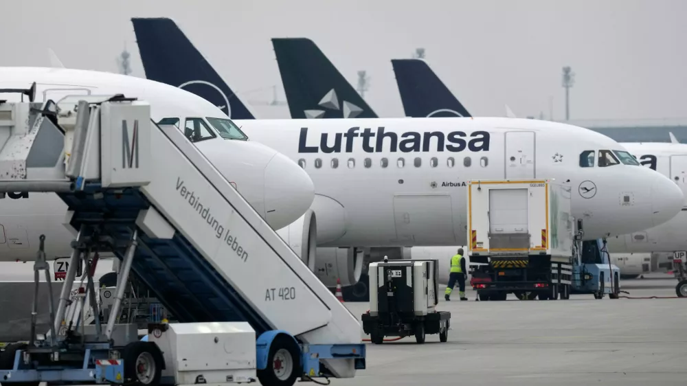 Lufthansa aircraft are parked at an airport as Lufthansa pilots are on a two-day strike in Munich, Germany, Monday, April 13, 2026. (AP Photo/Matthias Schrader)