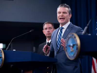 Defense Secretary Pete Hegseth speaks to members of the media during a press briefing at the Pentagon, Thursday, April 16, 2026 in Washington. Behind Hegseth is Adm. Brad Cooper. (AP Photo/Kevin Wolf)